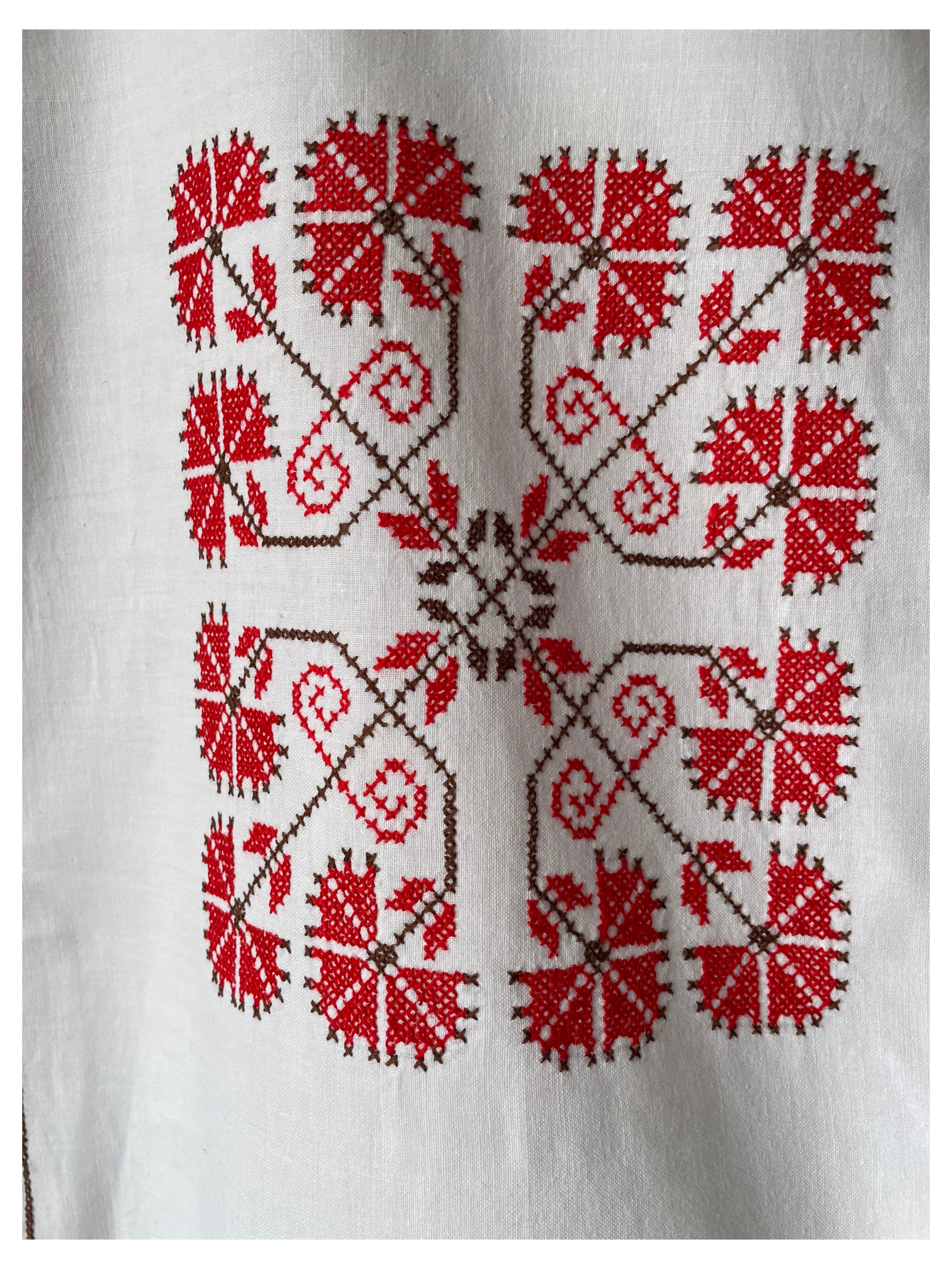 Red cross-stitch
