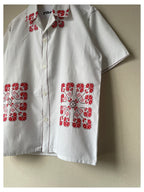 Red cross-stitch
