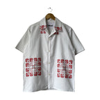 Red cross-stitch